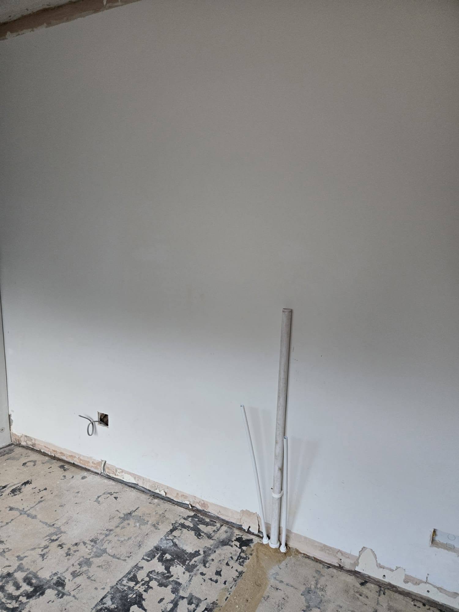 Stripped back: The old room cleared to the floor and walls.
