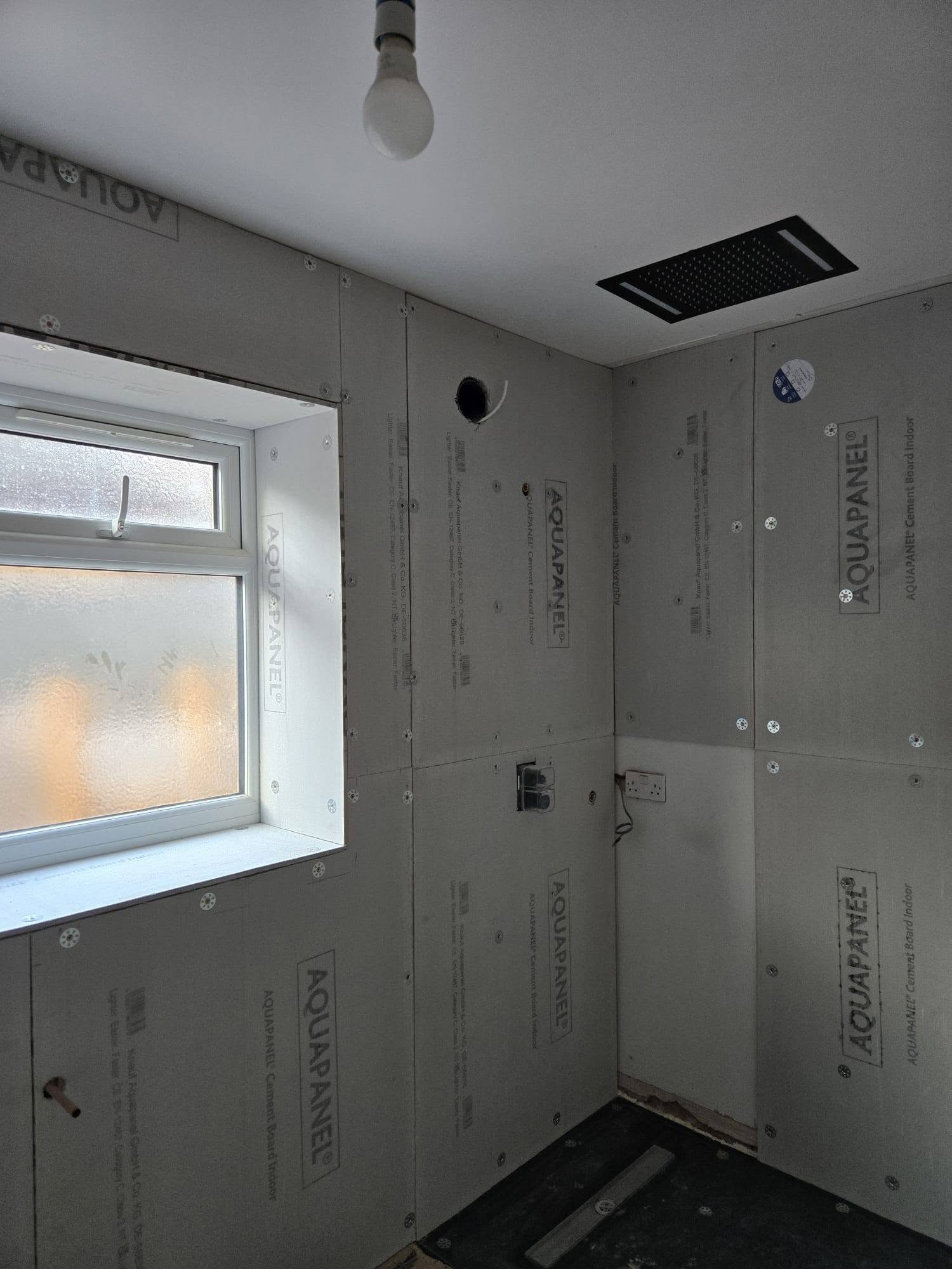 Boarded: Walls lined with Aquapanel cement board.