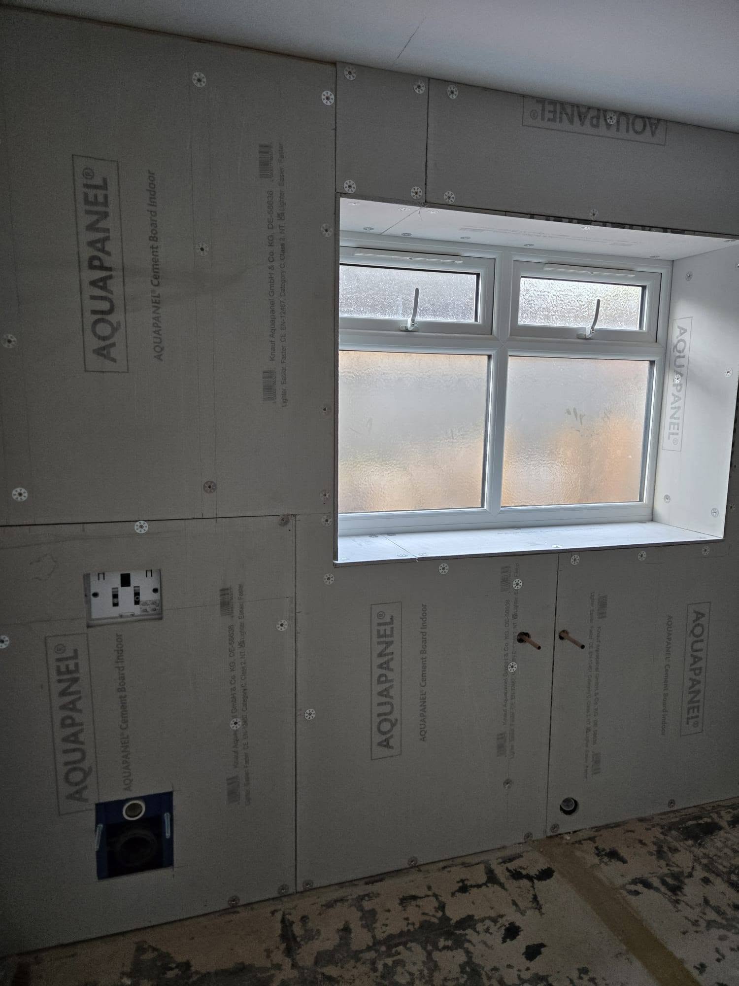Concealed WC: Frame and cistern hidden behind the wall.